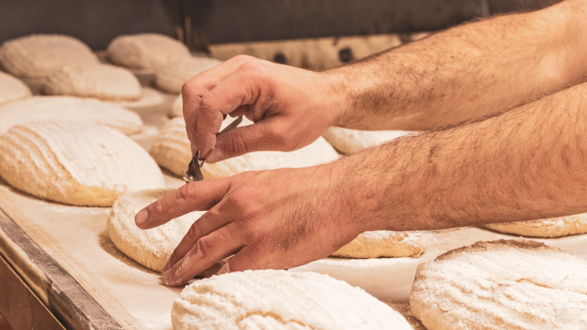 A person making pastries.